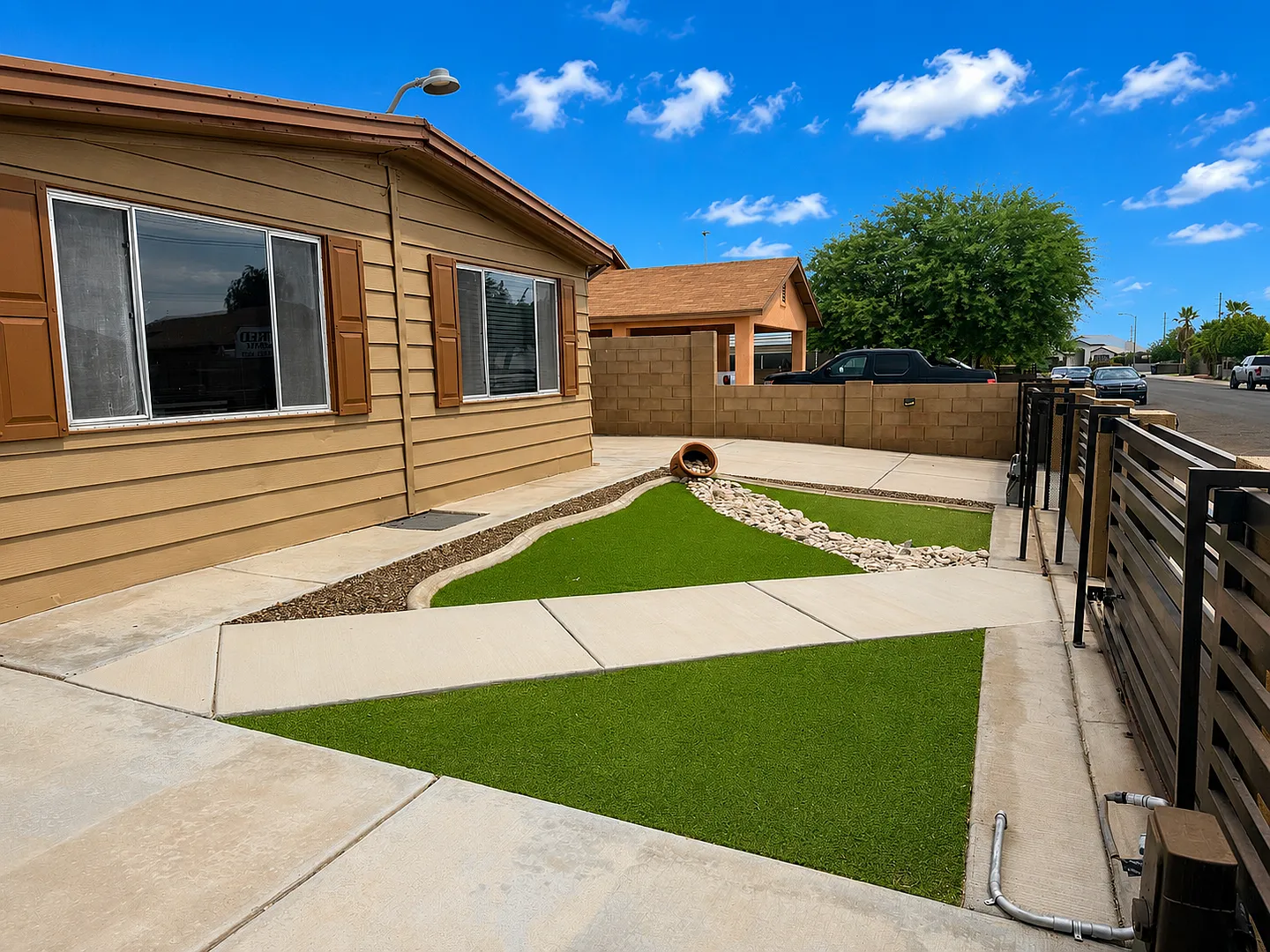 Fully Fenced 3 Bedroom Home with Covered Parking and Landscaped Property — Photo 2