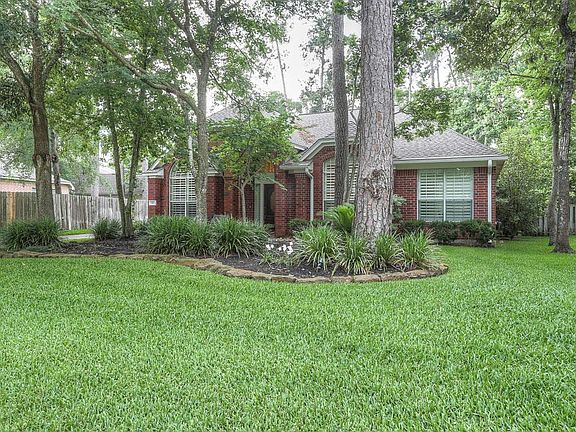 Front yard is welcoming with a shady area to relax outside!
