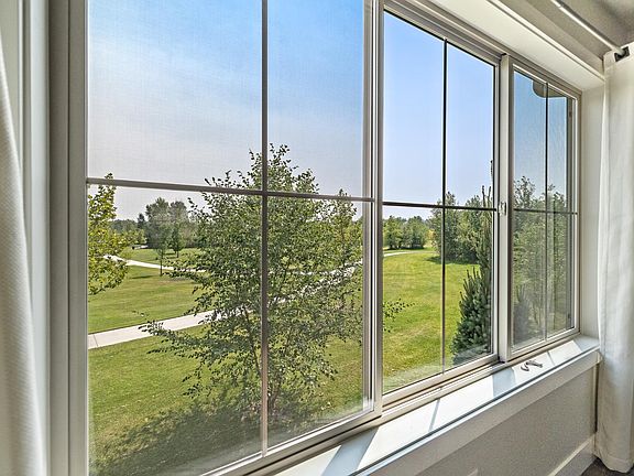 Great room windows overlook the park and beautiful Foothill views