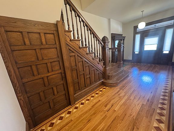 Restored and stained paneling on the historic staircase