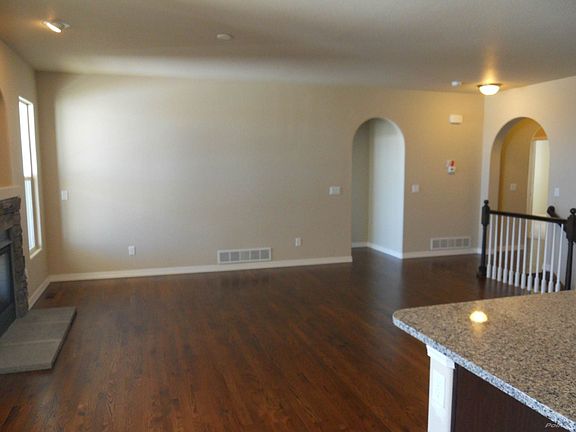 Great Room -- Arched Doorways to BedRooms