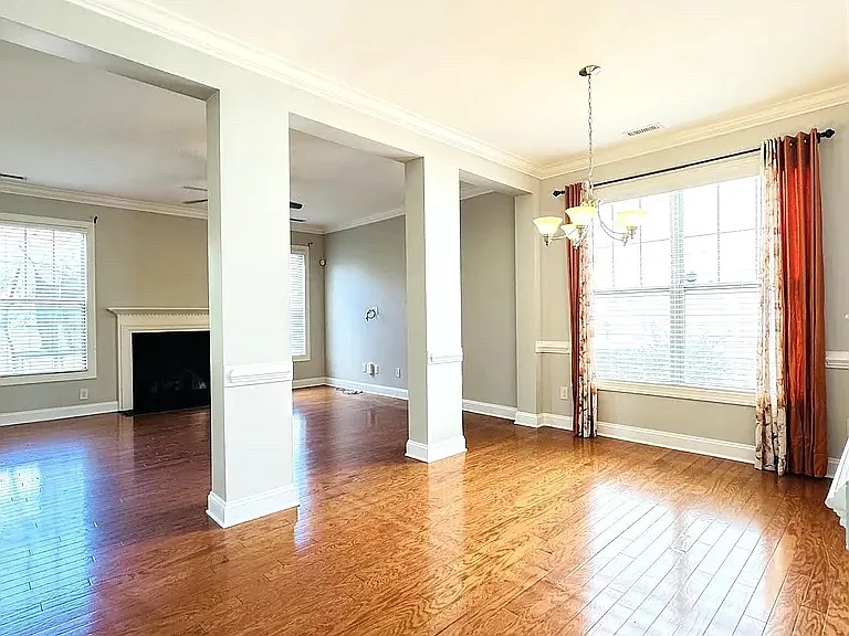 Hardwood floors throughout living and dining area
