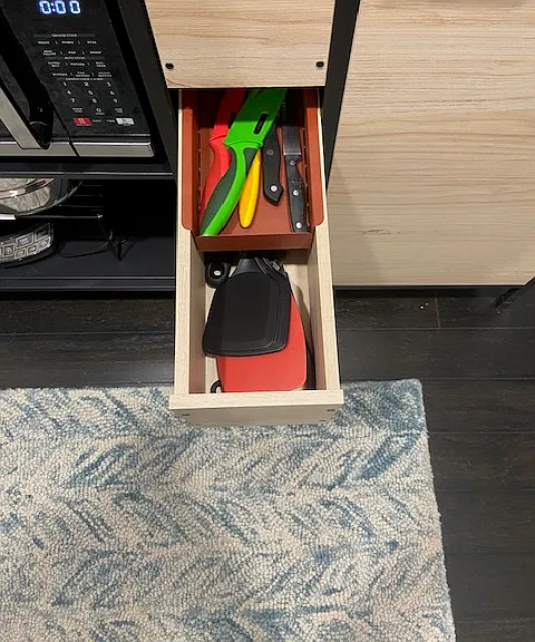 Full set of cooking knives and basic utensils.