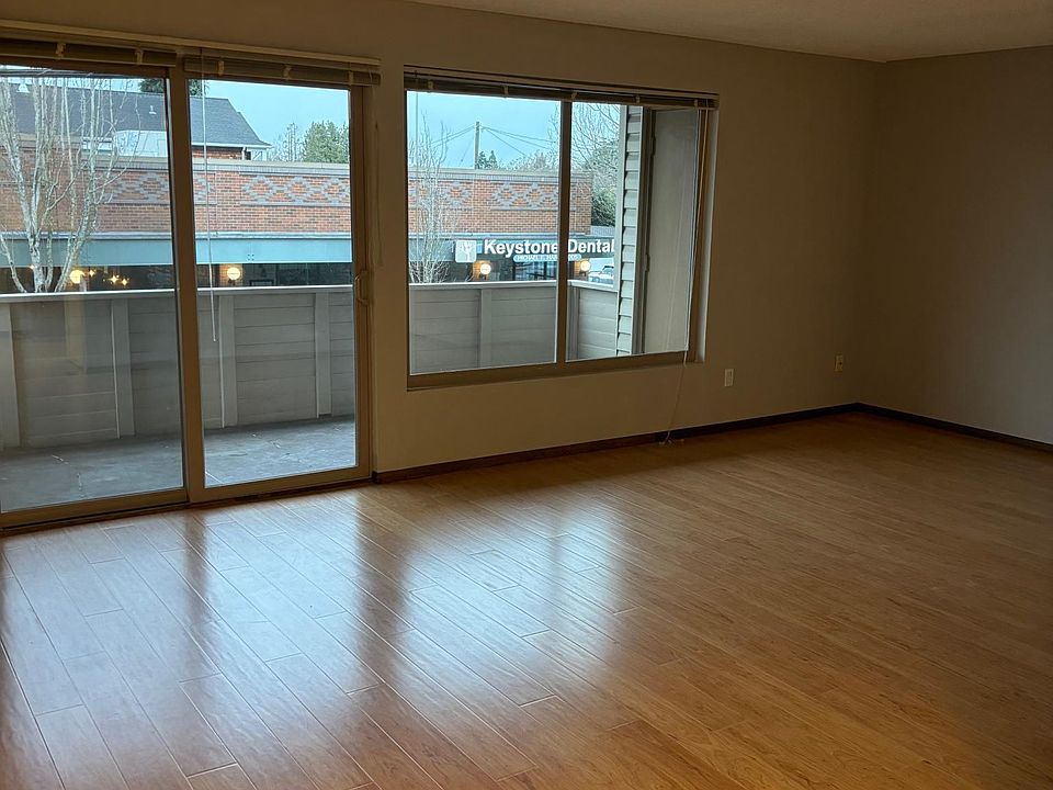 living room looking from dining area out toward balcony