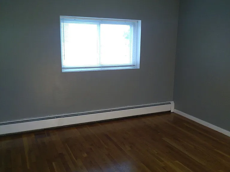 New blinds and freshly painted bedroom