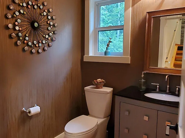 Powder room is located on the 1st floor.