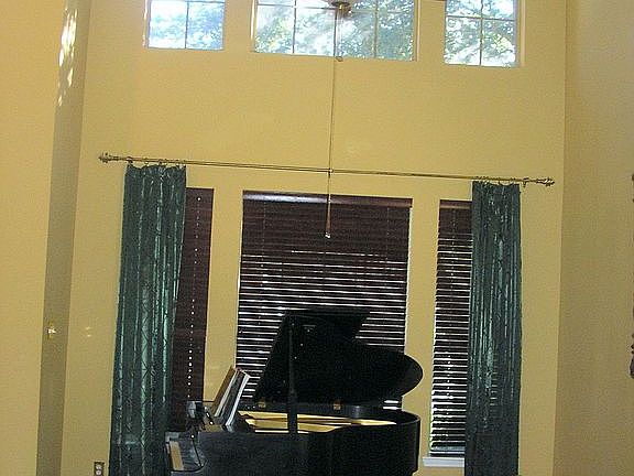 Living room with 2-story ceiling