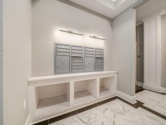 Mail and package area in secured foyer.