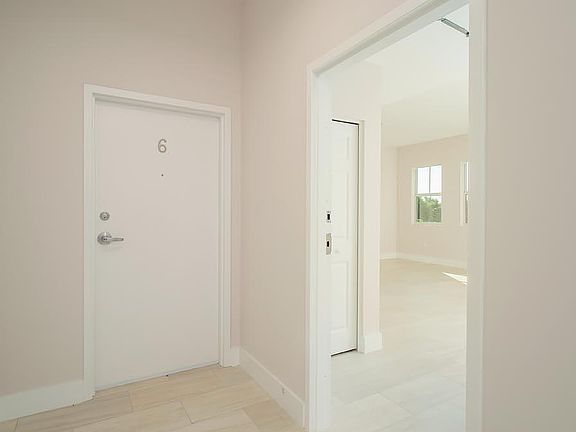 Hall and door into apt