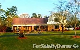 Beautiful 3 acre Family Estate
						:
						Beautiful sunsets from your front porch rockers