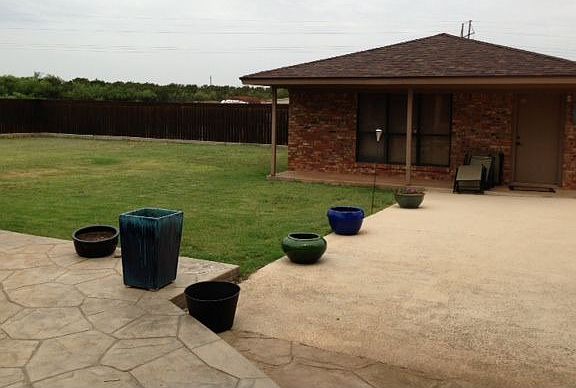 back yard & poolhouse