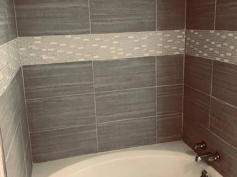 Large oversized bathroom tub with shower