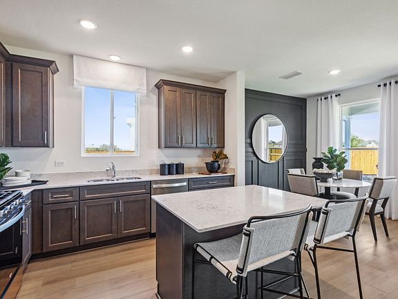 Natural and pendant lighting in kitchen