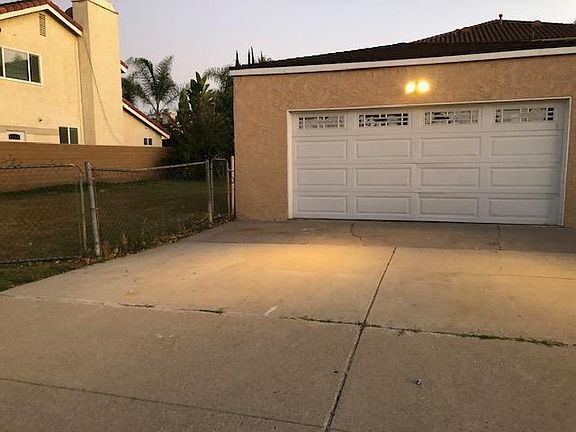 Garage, driveway, & side yard