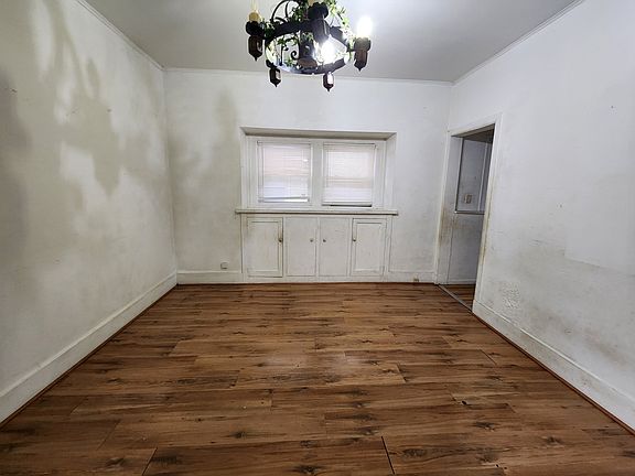 Formal dining rm with built in buffet for added storage