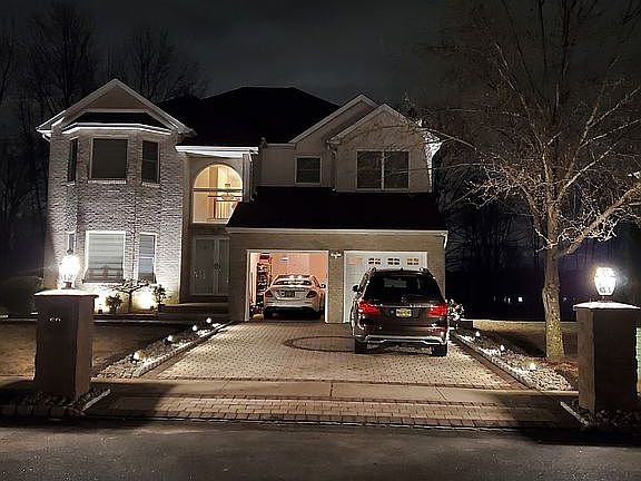 Stone Driveway with Pillars