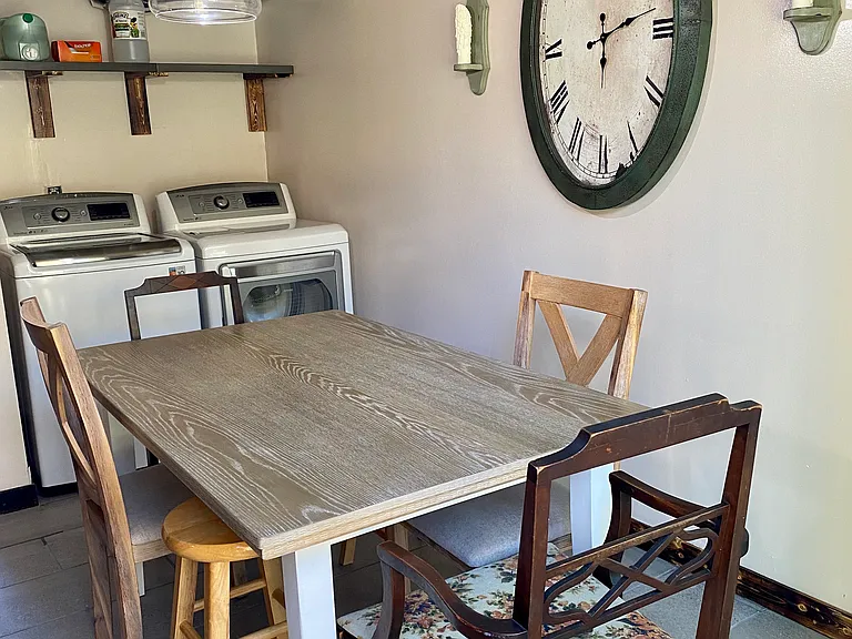 Unique Weasley inspired dining table. Washer and dryer conveniently located in unit.