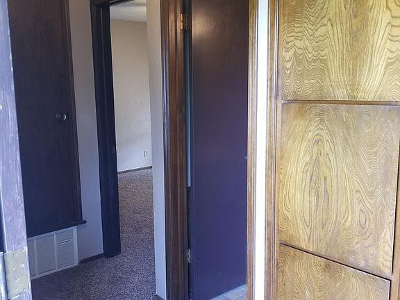 Entry, looking towards bedroom hallway