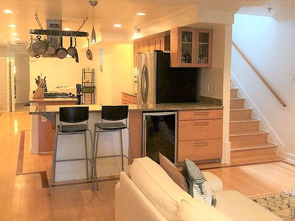 Wine fridge - stairs leading upstairs