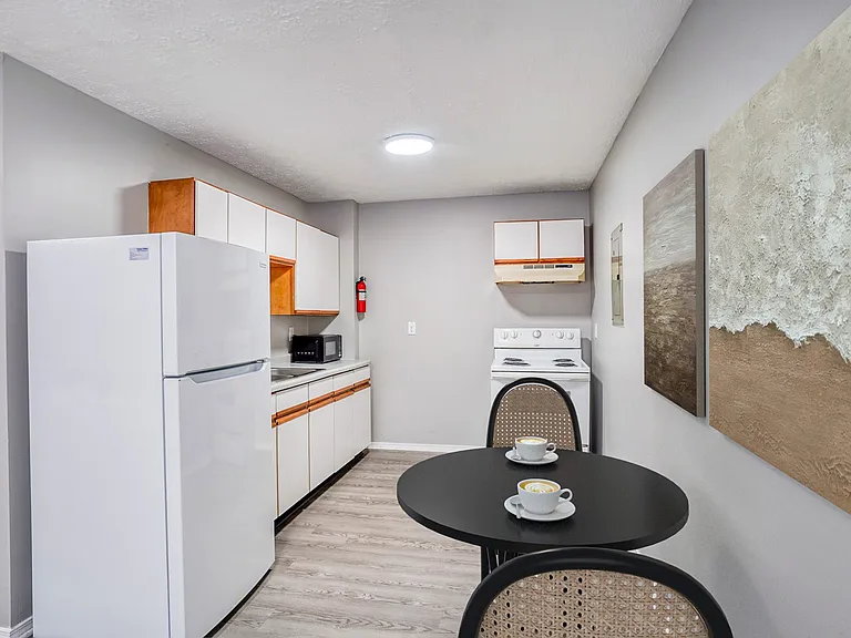 Welcome to Four Eight Group, where modern living meets convenience. This pristine kitchen features sleek appliances and a cozy dining space, perfect for entertaining or enjoying a quiet meal. Don't miss your chance to call it homeAE'AaAa AaaAE'AaA AAAaAAa