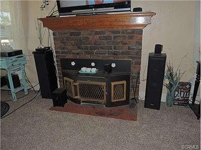 Fireplace with insert in living room