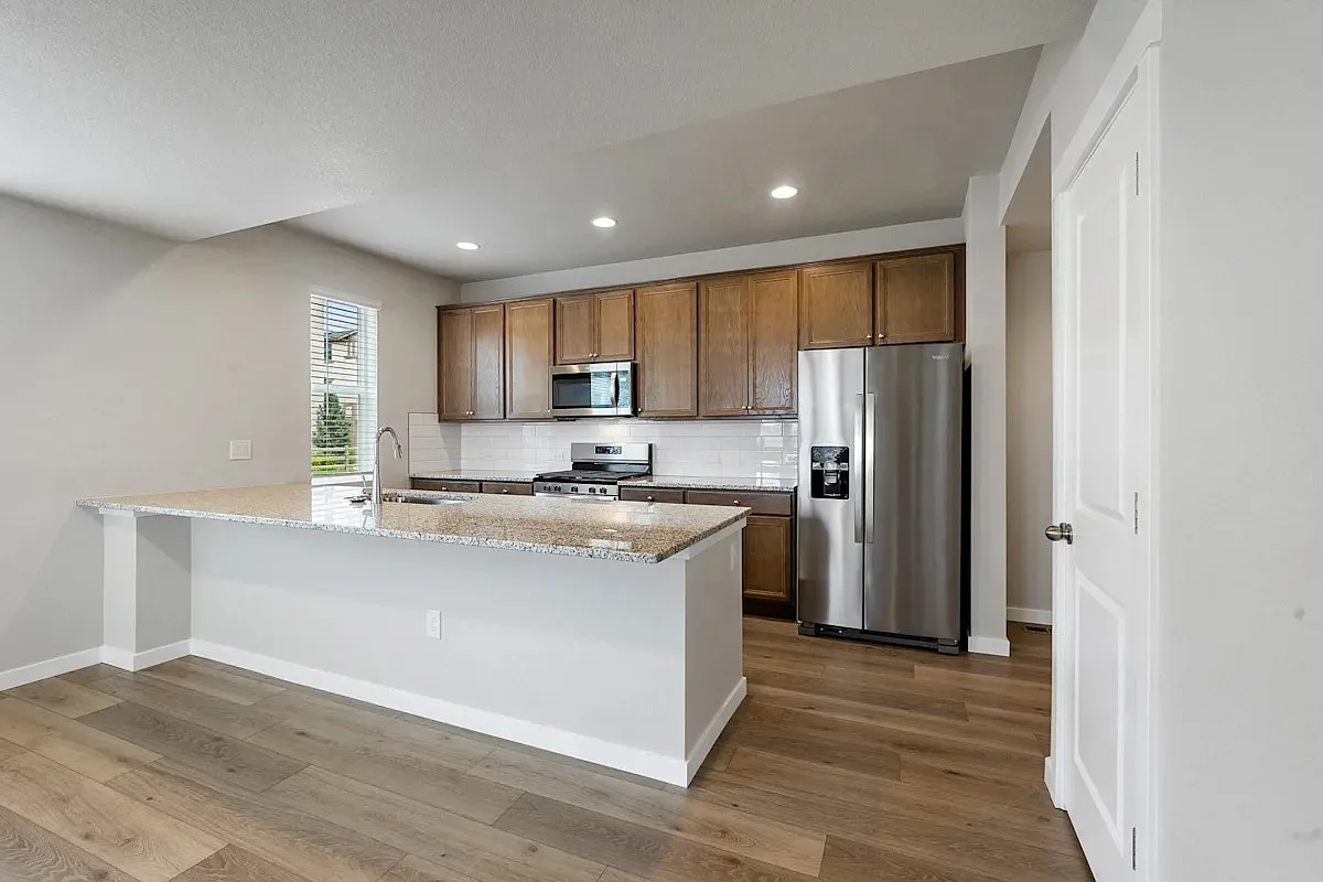 Greenways at Sand Creek Townhomes — Photo 4
