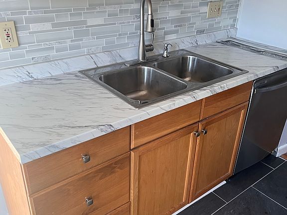 New countertops, backsplash and fixtures