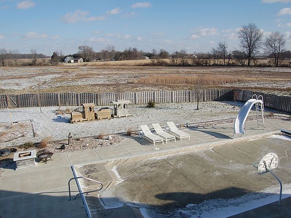 Half acre with inground, heated pool