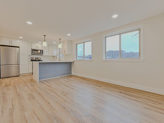 Spacious Living Area with Open Plan Kitchen and Dining
