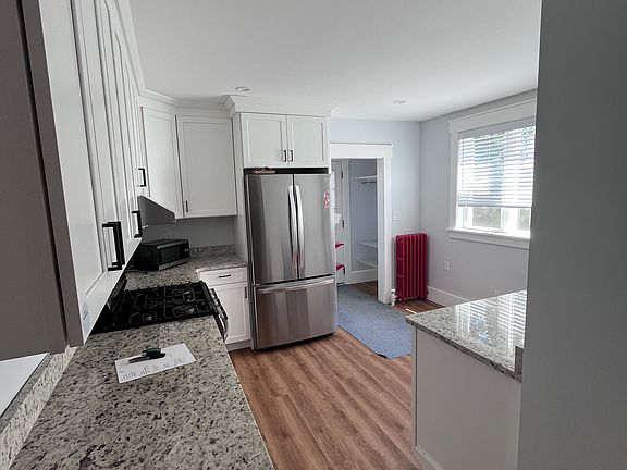 Kitchen, looking to back entrance