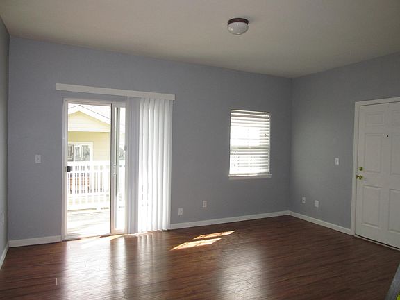 Living room and dinning room have hardwood floors. Balcony out of the living room.
