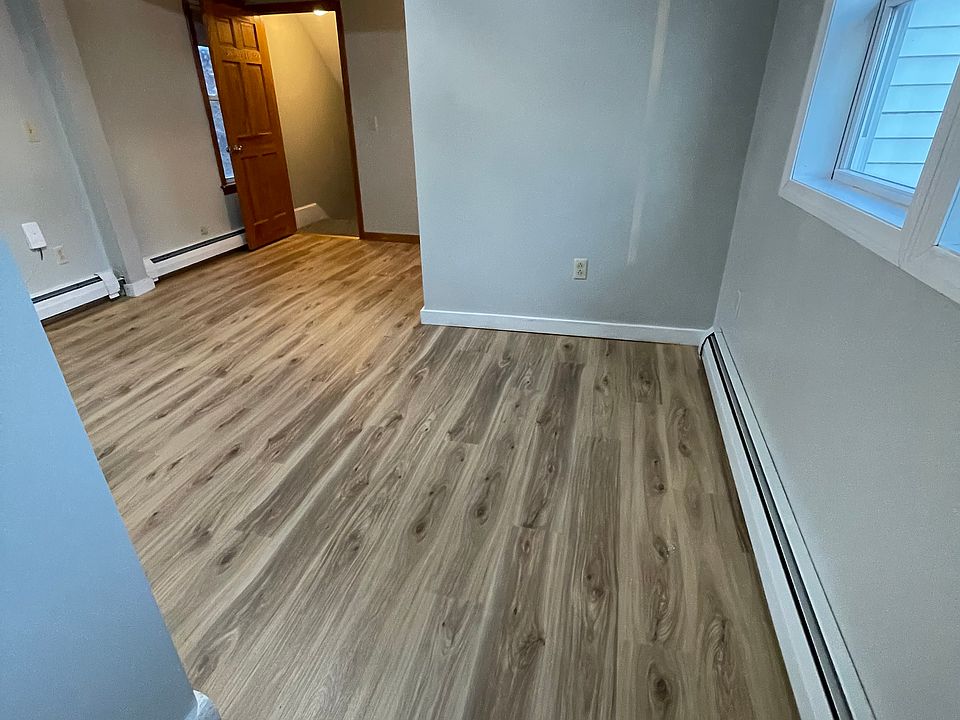 Living room view coming out of the bathroom.