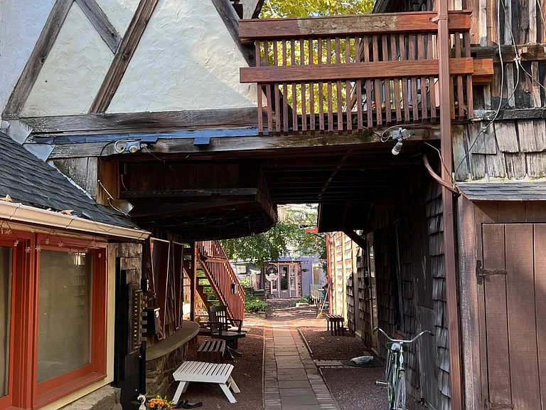 You can see the upper deck from the main street entrance side where we have a garden and a small courtyard.