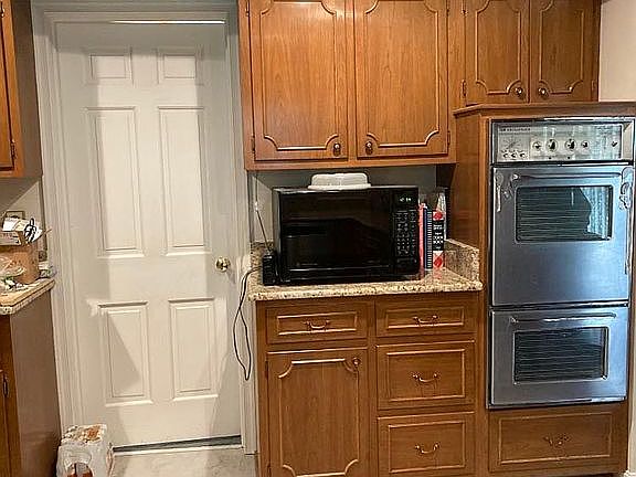door to dining, wall ovens