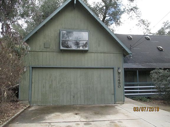 Garage with apartment above