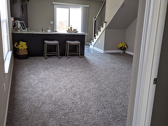 LIVING ROOM AND KITCHEN AREA