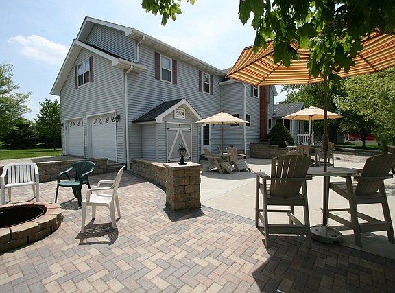 Exterior Front-Recent Improvements Kitchen, Sun Room/Family Rm, & Paver Patio