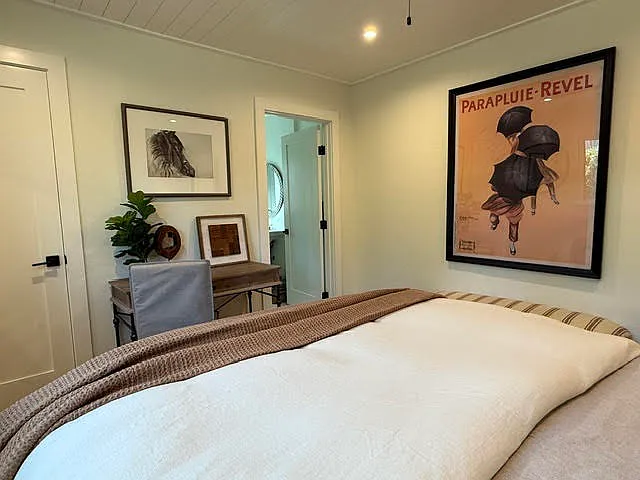 Bedroom 2, queen bed, walk in closet and on-suite full bath