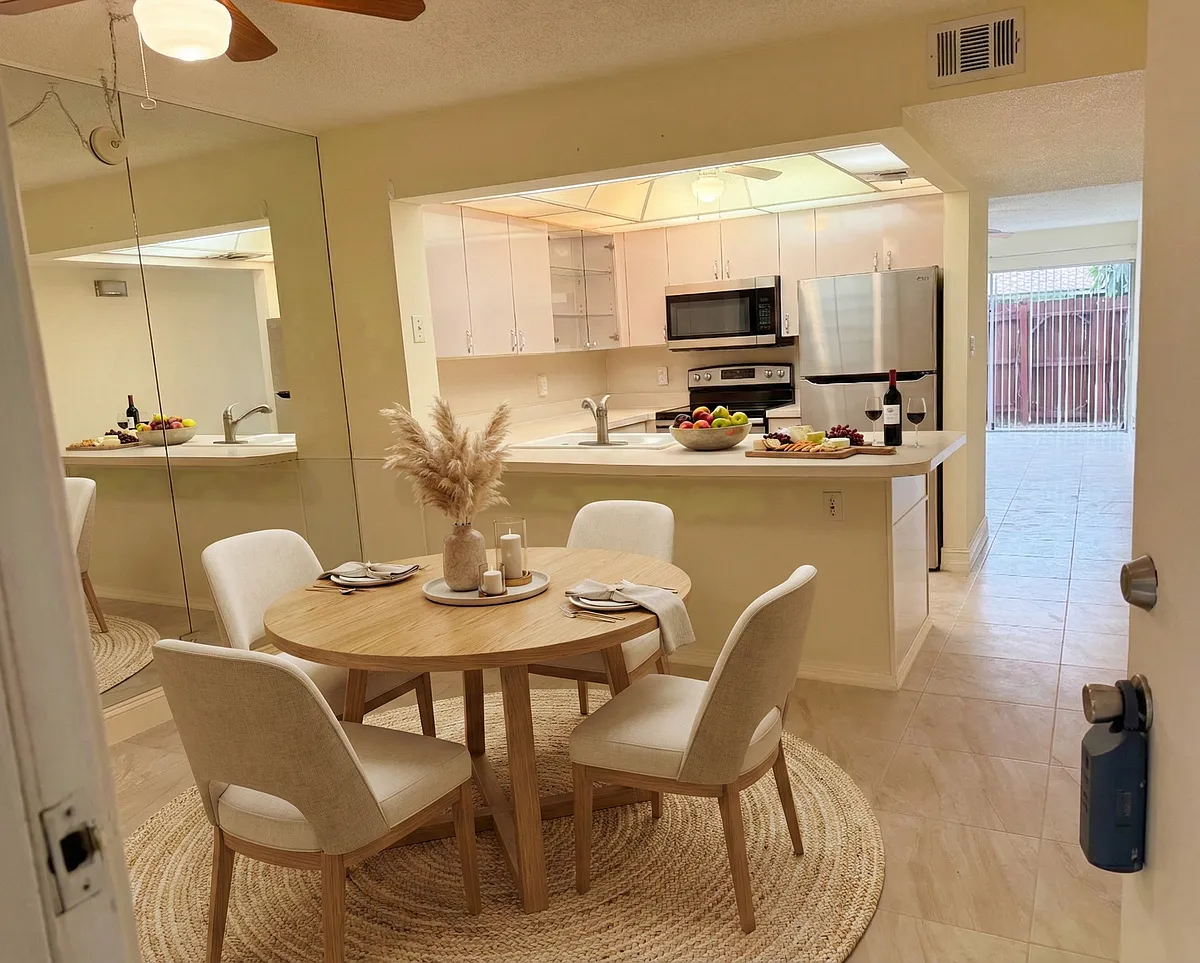 kitchen with staged furniture - 2763 Woodgate Ln #108