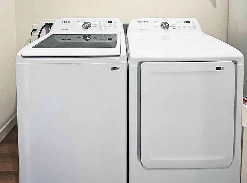 In-home laundry area — representative home at Deer Valley 24.