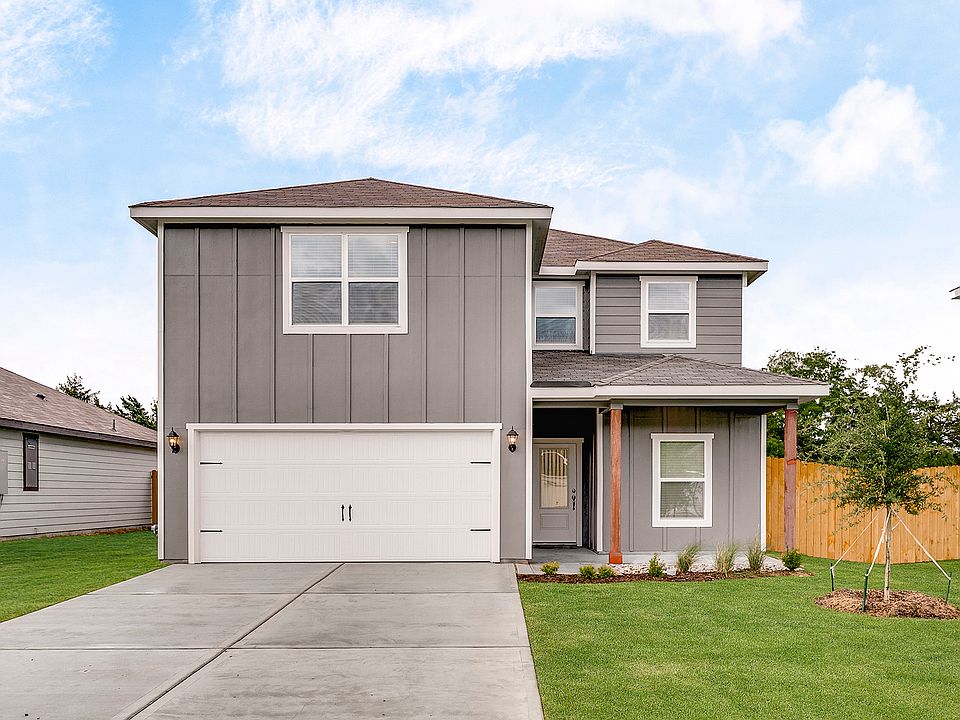 The two-story Driftwood plan is a beautiful siding home.