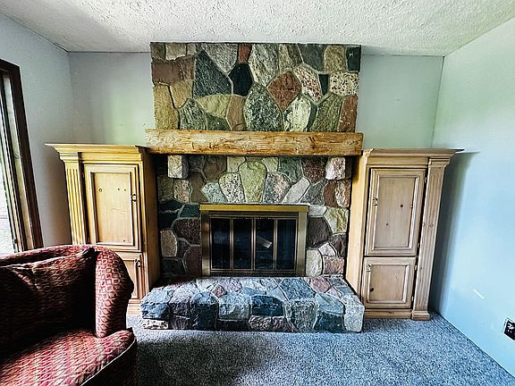 Field  stone wood fireplace