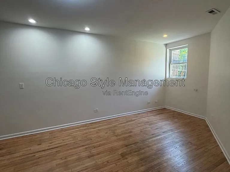 7833 S Colfax Ave — Photo 6