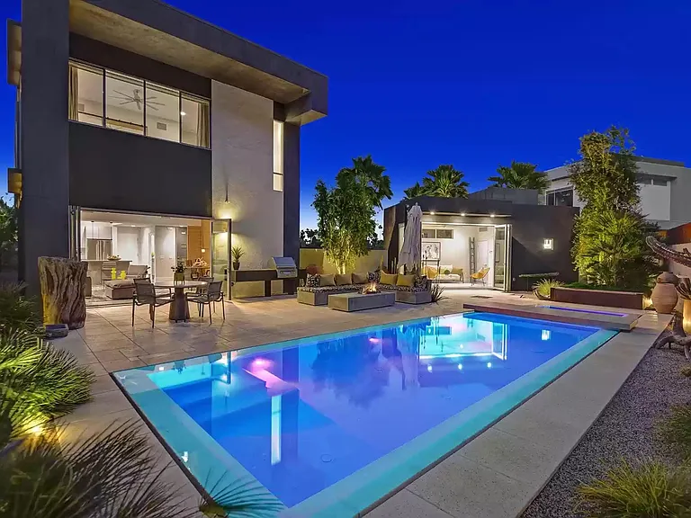The pool lit at night.