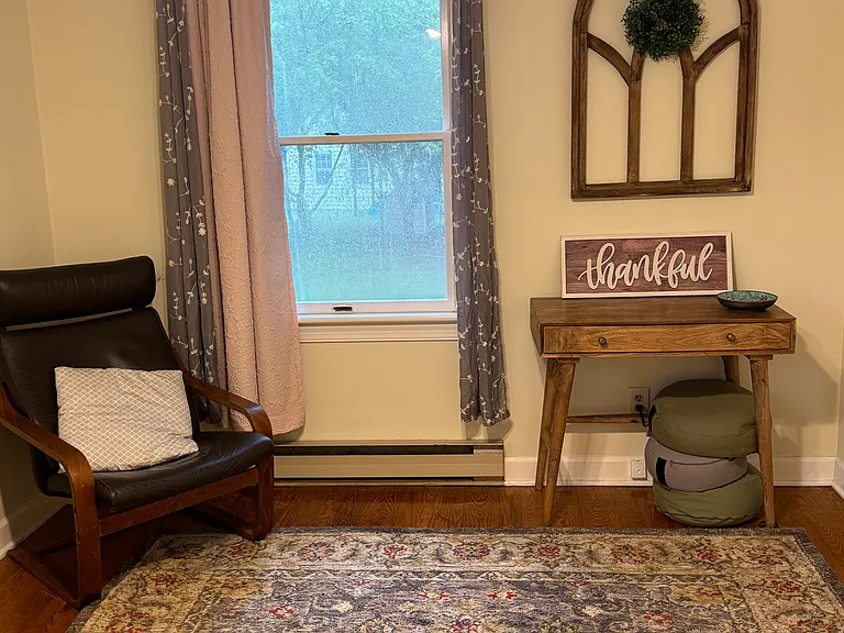 Downstairs Left bedroom with shared bathroom with shower and tub