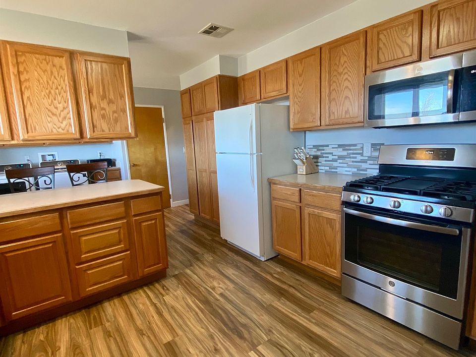 Kitchen with gas stove newer dishwasher