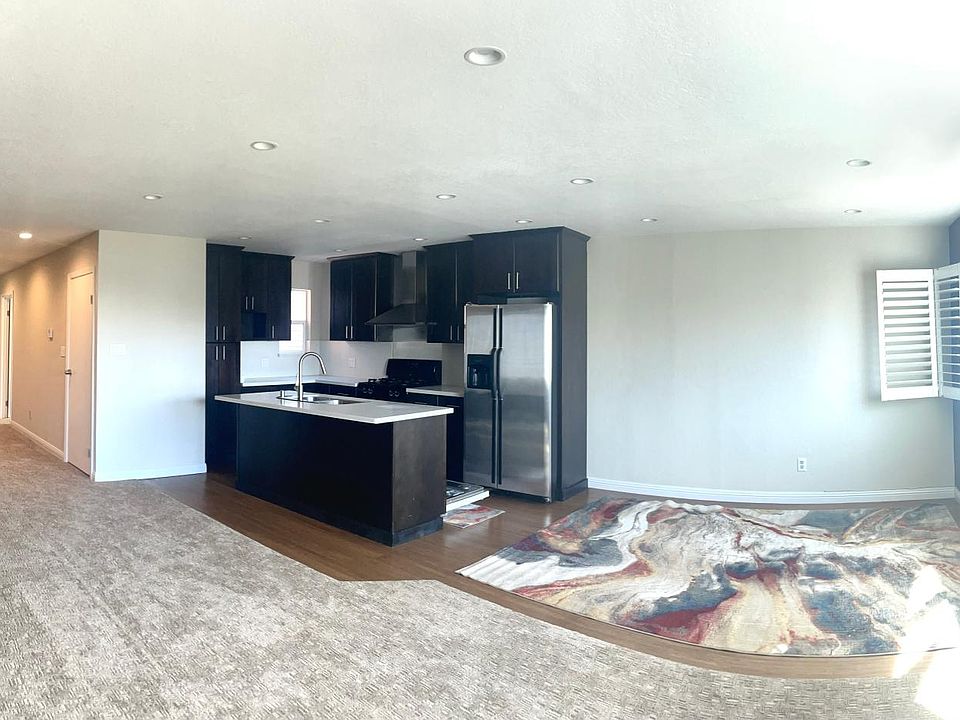 Hall, kitchen and dining area view (panoramic photo)