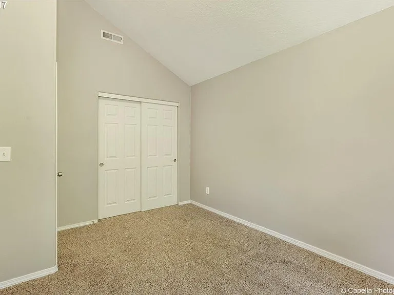 Second Bedroom with dedicated walk in closet space.