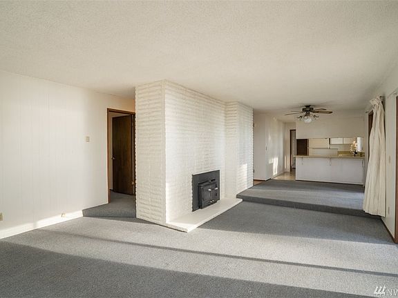 Great open design with three sliders off the living and dining areas for outdoor living and entertaining.
