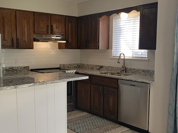 Kitchen and sliding glass door view to balcony